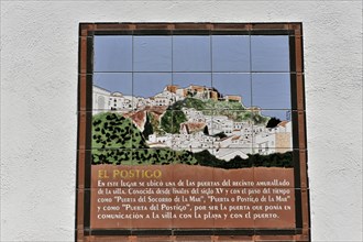 Solabrena, ceramic information panel on a wall telling the story of a historic urban area, Costa