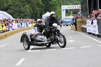 Motorbike with sidecar and riders in leather clothing at a classic car race, SOLITUDE REVIVAL 2011,