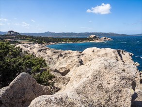 Typical granite rock formations in front of a bay, Baja Sardinia, Costa Smeralda, Sardinia, Italy,