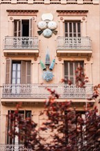 Clay parasols on the facade of a house on the Ramblas in Barcelona, Spain, Europe