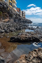 The rock walls of the beautiful beach of La Garita (Telde), Gran Canaria, Canary Islands