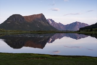 Landscape on the Lofoten Islands. Vagspollen bay, with Offersoykammen mountain behind it. The