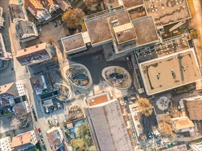 Aerial view of a roundabout with adjacent streets and buildings, sunrise, Nagold, Black Forest,