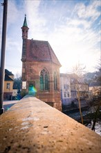A historic church with sunlight falling on the old architecture, Calw, Black Forest, Germany,