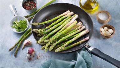 Healthy green asparagus in a brighter scenery with ingredients and spices, green asparagus,