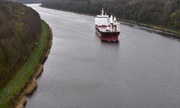 Aerial view of a cargo ship in the Kiel Canal, Schleswig-Holstein, Germany, Europe