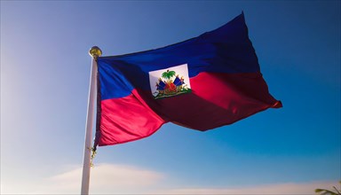 Flags, the national flag of Haiti flutters in the wind