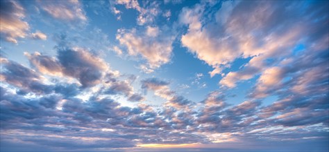 Blue sky with clouds in the evening light, panorama, wallpaper, sky replacement