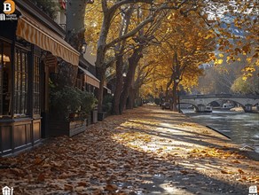 Herbstliche Szene auf einer Strasse neben einem Fluss mit fallenden Blaettern und warmem