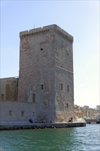 Marseille, Old fortress tower on the shore with clear sky in the background, Marseille, Departement