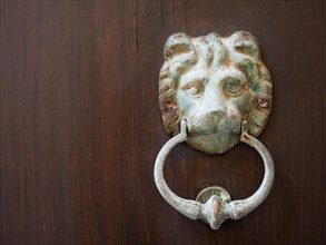 Lion's head, door knocker, Alghero, Sardinia, Italy, Europe