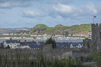 Town wall, Conwy, behind it Deganwy, Wales, Great Britain