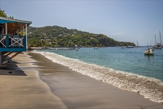 A beach in the Caribbean on the Atlantic coast in Deshaies, Guadeloupe, French Antilles, North