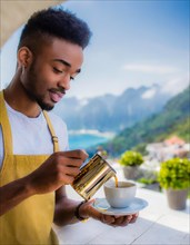Young african Person in yellow apron brewing coffee on a balcony with magnificent mountain views,
