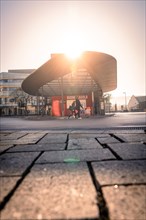 Modern bus station with backlight, sunrise, Nagold, Black Forest, Germany, Europe