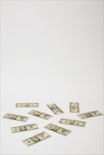 Close-up of US twenty dollar bills with portrait of Andrew Jackson on white background, Studio