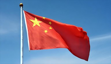 Flag, the national flag of China flutters in the wind