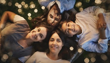Overhead view of friends lying down together, bonding with happy expressions and bokeh effect, AI