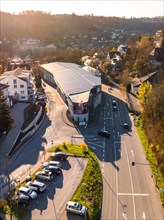 Aerial view of a modern building at a busy crossroads, Calw, Black Forest, Germany, Europe