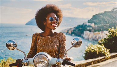 A radiant woman with an afro hairstyle rides a motorcycle along a picturesque seafront, blurry