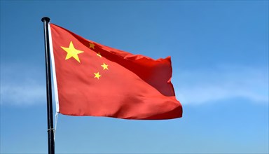 Flag, the national flag of China flutters in the wind