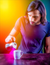 Man pouring from a moka pot with intense neon lighting and a blue and purple ambience, Vertical