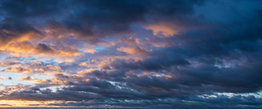 Dramatic storm clouds in the morning light, panorama, wallpaper, sky replacement