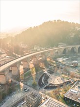 Bridge spanning a town during the golden hour with soft sunlight, sunrise, Nagold, Black Forest,