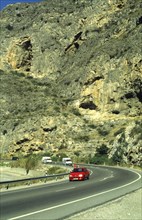 Traffic in Sierra Nevada, Grenada region, Andalusia, Spain, South Europe. Scanned thumbnail slide,