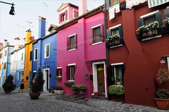 Colourful houses, Burano, Burano Island, Colourful architecture and blooming flower pots along a