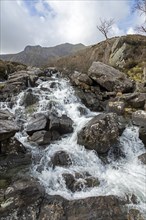 Mountain stream at the LLyn Idwal hiking trail, Snowdonia National Park near Pont Pen-y-benglog,