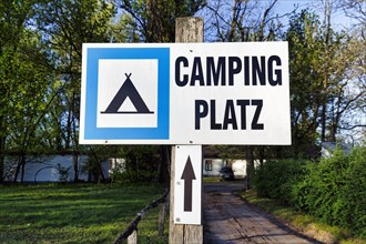 Sign with inscription campsite, pictogram tent, Bugac puszta, Kiskunsag National Park, Hungary,