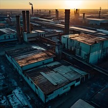 Drone shot of the vast expanse of an abandoned factory complex, AI generated