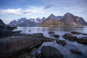 Landscape with sea and mountains on the Lofoten Islands, view over the fjord Flakstadpollen to the