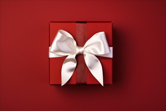 Red gift box with white bow. KI generiert, generiert, AI generated
