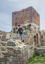 Boy run on Hammershus which was Scandinavia's largest medieval fortification and is one of the