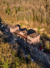Drone image of a historic building with car park and trees, Calw, Black Forest, Germany, Europe