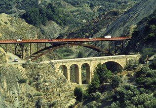 Road bridges in the mountainous Spanish landscape, Andalusia, Spain, Southern Europe. Scanned
