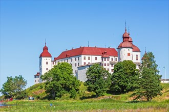 Lacko castle a famous white baroque castle by Lake Vanern in the summer, Laeckoe, Lidkoeping,