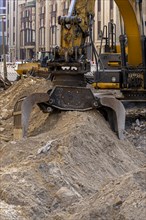 Excavator, road construction site in Berlin-Mitte, Germany, Europe