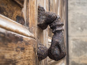 Hand as door knocker, Alghero, Sardinia, Italy, Europe
