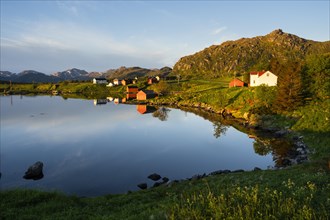 Landscape on the Lofoten Islands near Eggum. Houses on a fjord. At night at the time of the