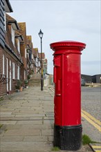 Red letterbox, The Stade, harbour, Folkestone, Kent, Great Britain