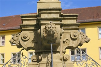 Fountain with lion heads, stone figures, Winnental Castle built in the 15th century by the Teutonic
