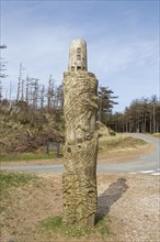 Wooden artwork, lighthouse, LLanddwyn Bay, Newborough, Isle of Anglesey, Wales, Great Britain