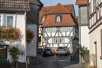Old schoolhouse, half-timbered house with mansard roof, cultural monument, listed building, old