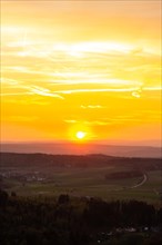 Panorama of a romantic landscape at sunset in the evening light. beautiful spring landscape in the