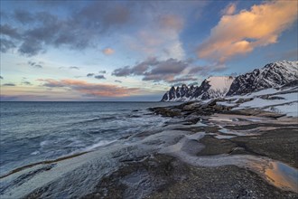 Rocky coast off Bergen, sea, waves, morning mood with clouds, winter, Tungeneset, Senja, Troms,