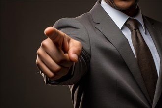 Man in business suit pointing finger at camera. KI generiert, generiert, AI generated