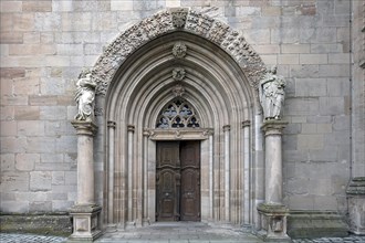 Early Gothic entrance portal with leaf masks of the Ebrach monastery church, Ebrach, Lower
